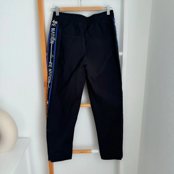 P.E Nation Torque Track Pants Snap Button Black Blue Stripe - Picture 6 of 16